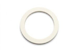 White circular ring (flat washer) photographed from above on a white background