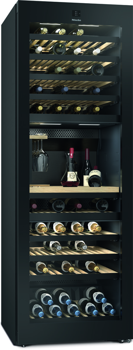 Tall black wine cooler with a glass door, filled with wine bottles on wooden shelves and a few decanters on a lower rack.