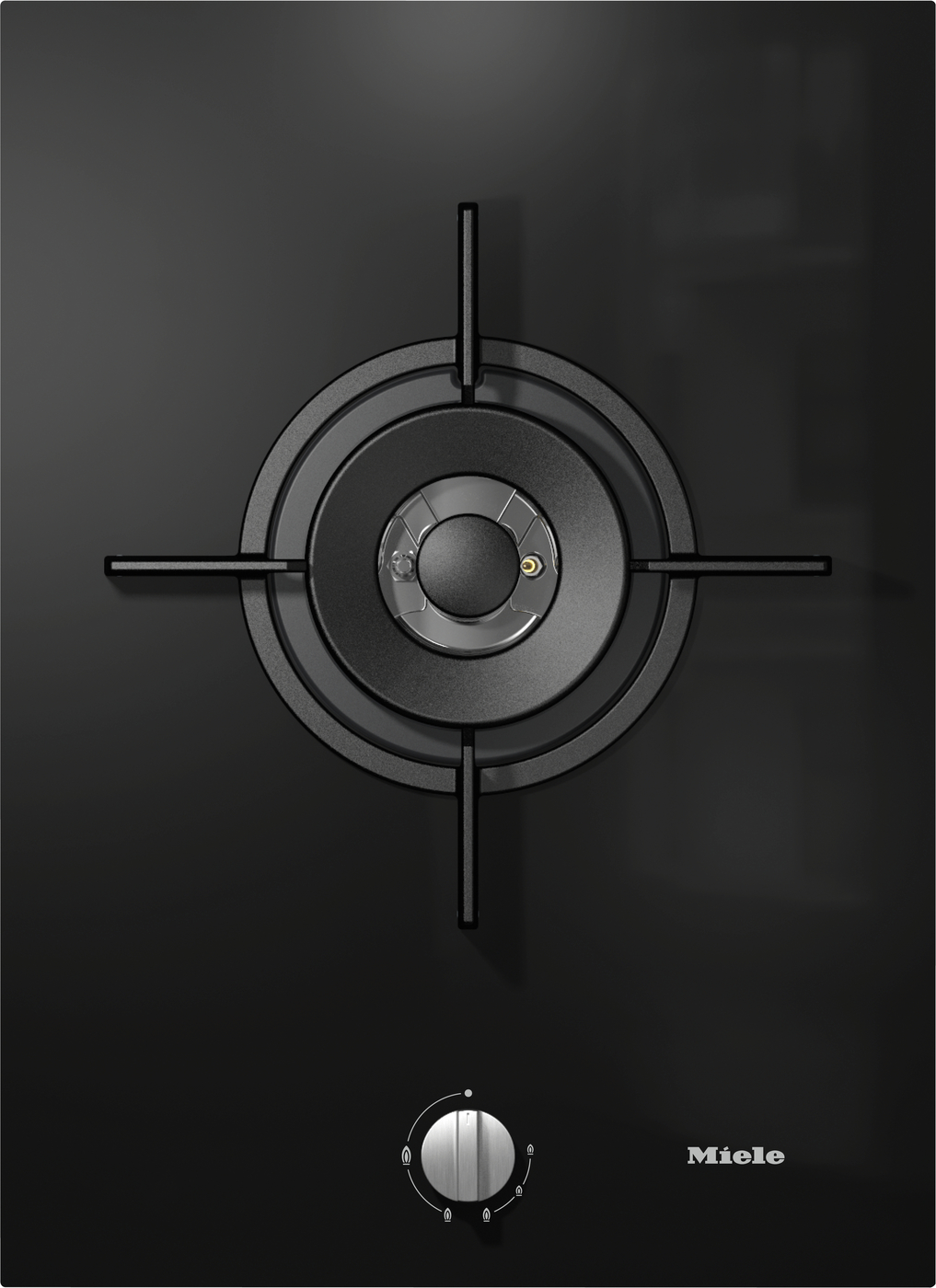 Top-down view of a black glass gas cooktop burner with a circular grate and centered burner, control knob below to the right; Miele logo visible.