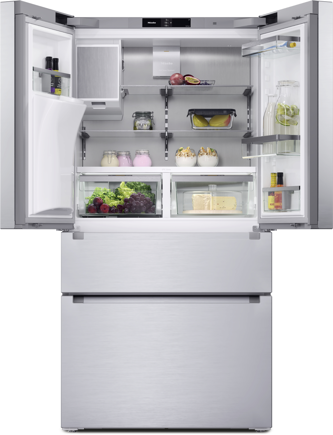 Open stainless steel refrigerator with four doors and a bottom freezer, showing shelves filled with fruit, vegetables, jars, and bottles inside.