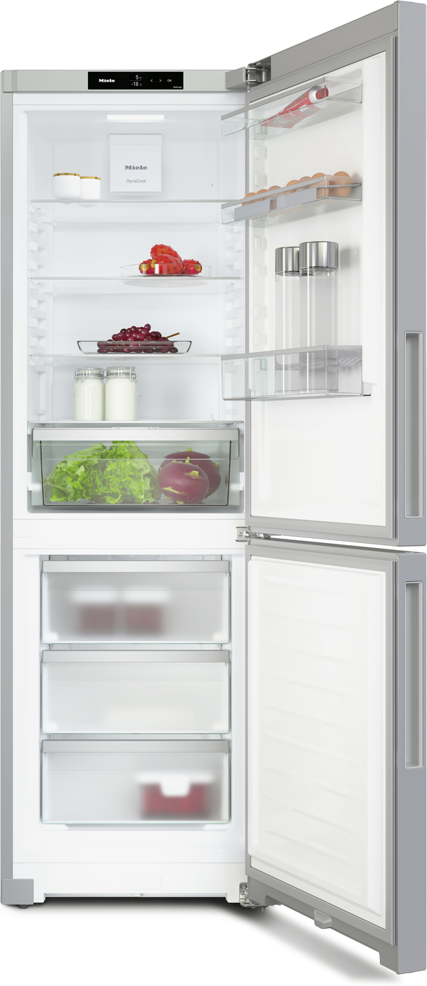 Open modern side-by-side refrigerator with fresh produce, milk, eggs, and bottles visible in shelves and drawers