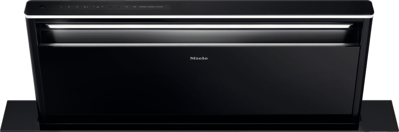 Black Miele built-in dishwasher front with a slim top control panel and handle, shown closed with an open-like upper rack area visible at the top edge.