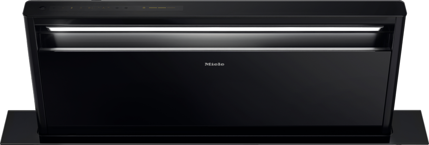 Front view of a black Miele built-in dishwasher with the control panel on top.