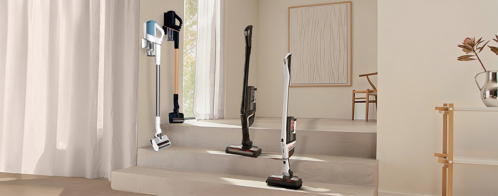 Five cordless vacuum cleaners stand on a light staircase in a bright, minimalist living space, as if on display for comparison.