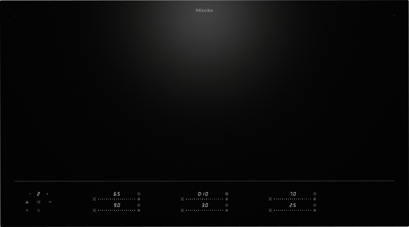 Miele induction cooktop with a sleek black glass surface and touch controls along the bottom edge.