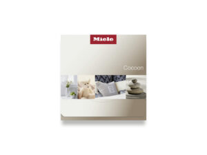 Miele Cocoon packaging box with a beige gradient background and a collage of interior photos beneath the logo region.