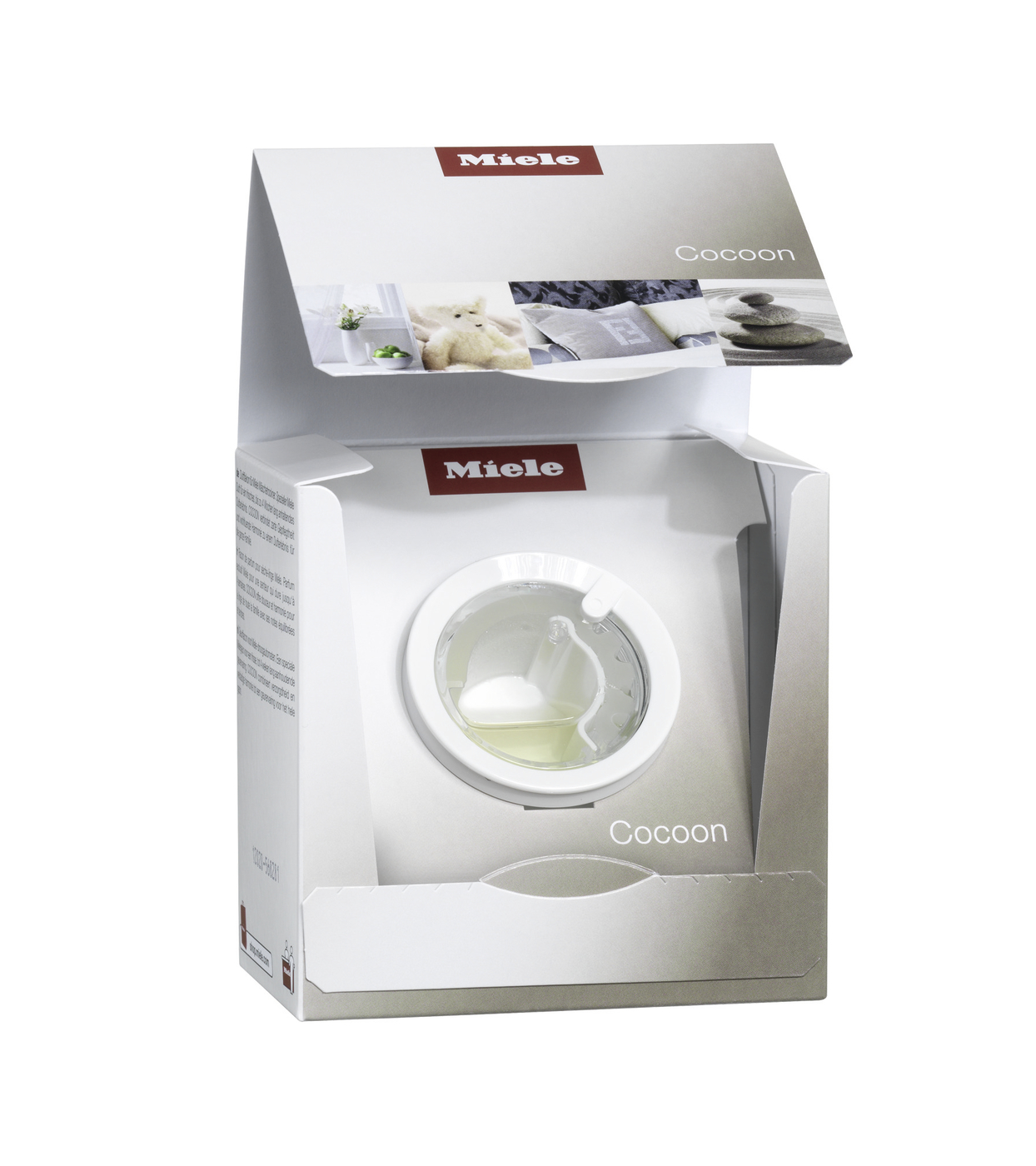 Box packaging for a Miele Cocoon front-loading washing machine, showing the circular door and detergent drawer inside the box interior.
