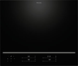 Top‑view of a black Miele induction cooktop with a glowing horizontal control line and illuminated digital controls along the bottom edge.